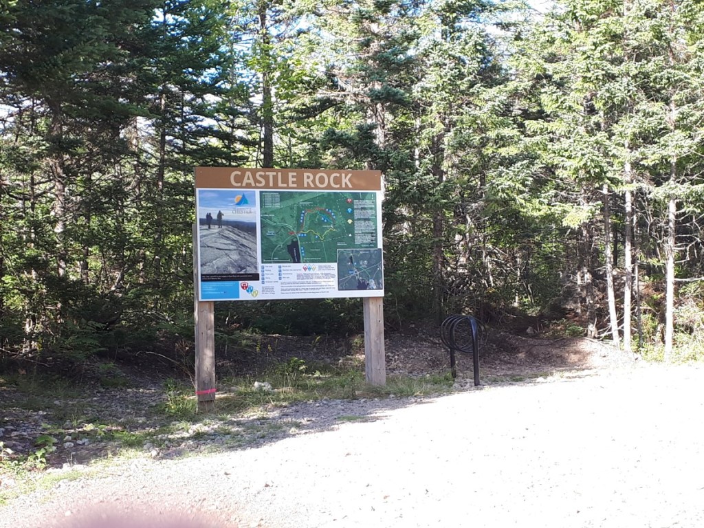 bike racks and trail sign at Castle Rock trailhead