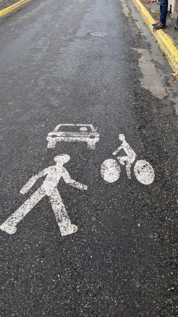 Road markings in Montech (car, bike and pedestrian symbols)