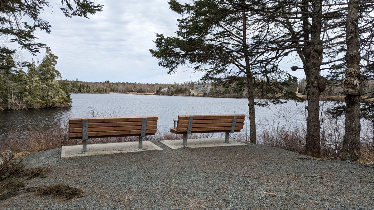 Two benches overlooking Chezzetcook River.